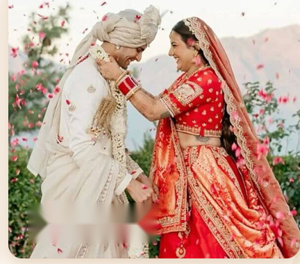 Couple Walking Under Shower of Rose Petals